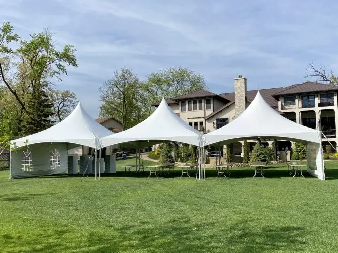 20×60-HP-Oak-Brook-scaled-e1699325990874 A 20x60 high peak tent setup at a mansion